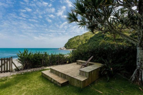 Casa ampla e aconchegante pé na areia no Canto do Moreira em Maresias